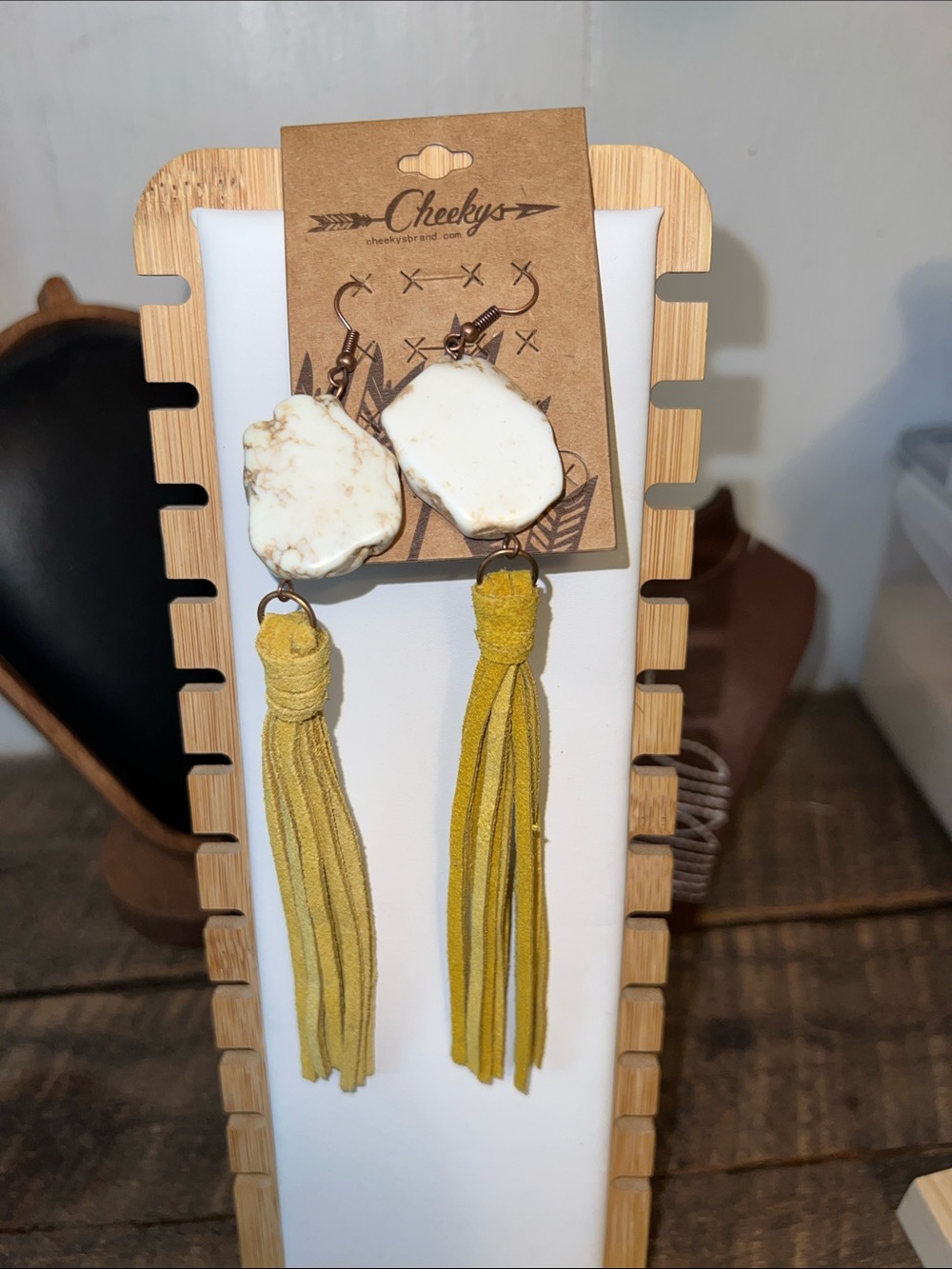 Cheekys White Stone Earrings with Mustard Tassels